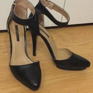 Black platform ankle strap pumps